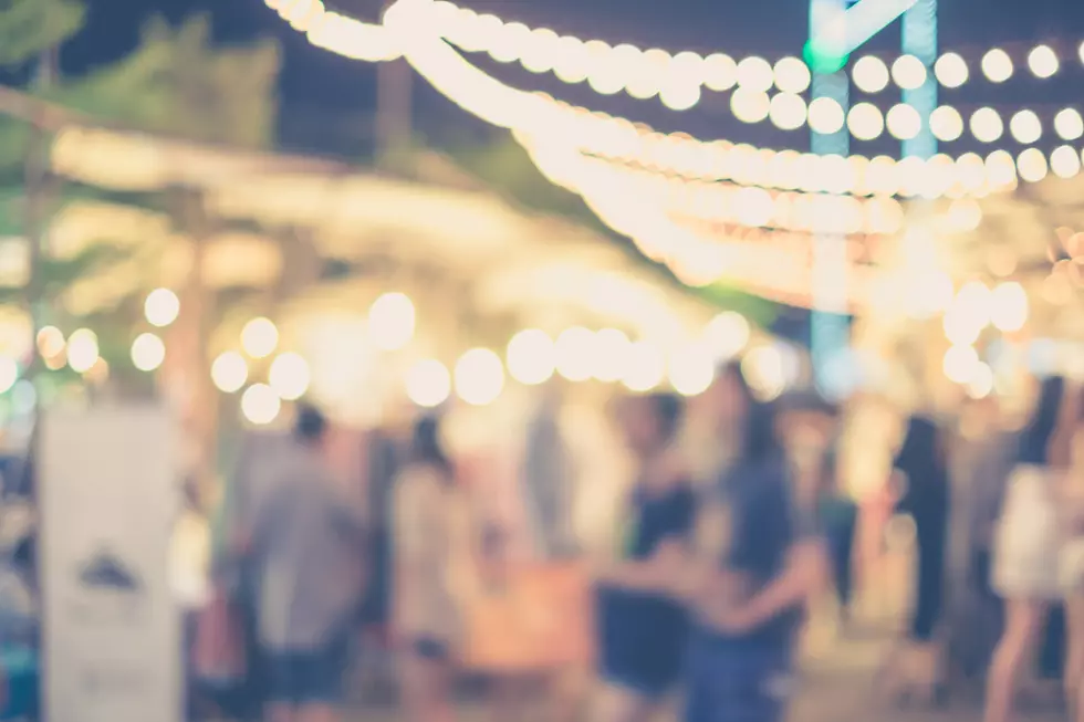 Abstract blurred people in night market or open street market for background