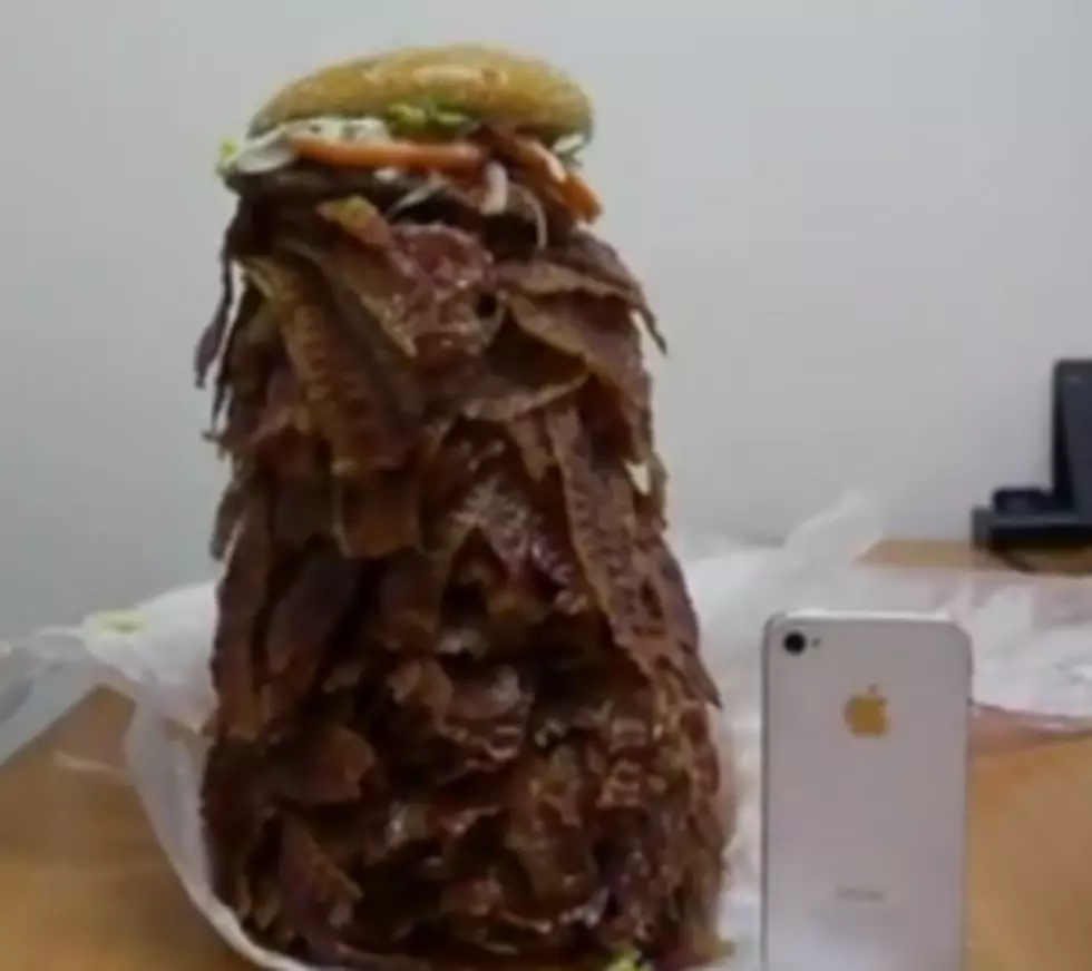 Man Attempts to Eat a Burger King Whopper With 1,050 Strips of Bacon! [VIDEO]