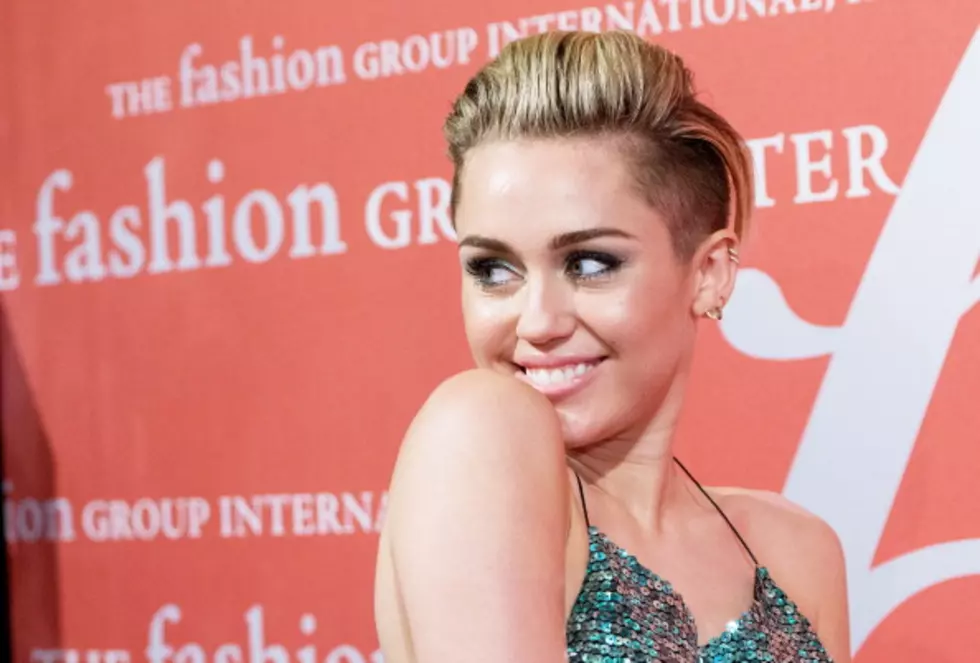 Miley Cyrus Crashes Saturday Night Live to Announce Tour (Video)