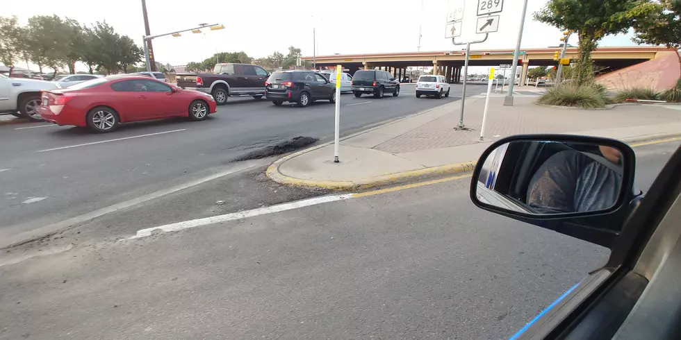 The ‘Hill’ in the Road Near Loop 289 and University That No One Wants To Fix