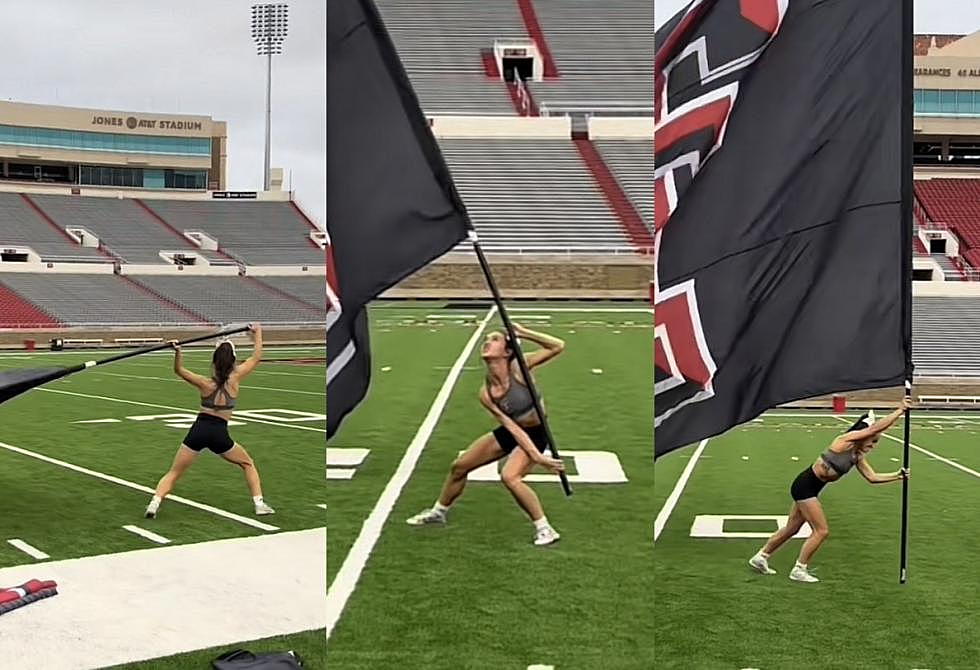 Viral Video Shows Tech Cheerleader Struggling to Run Giant Flag 