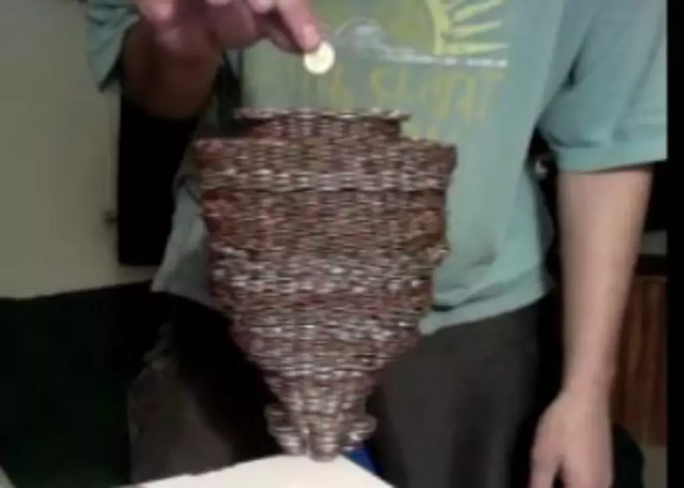 A Guy Stacked 3,118 Coins on Top of a Single Dime [VIDEO]