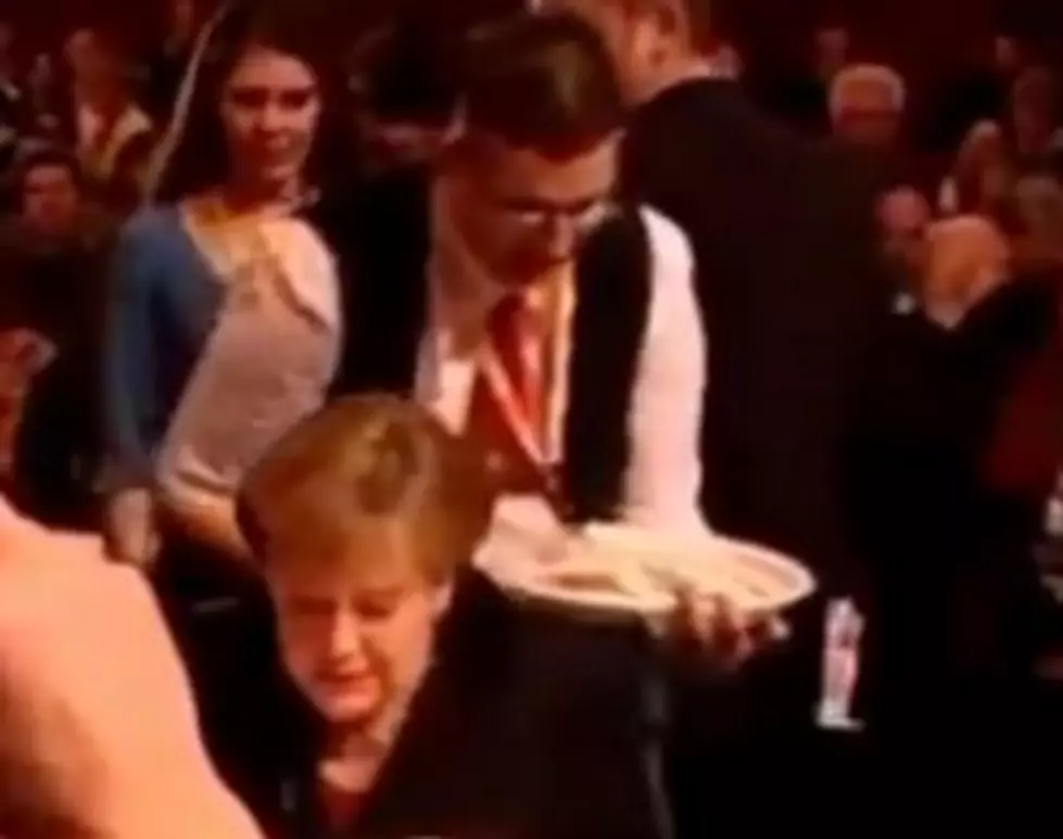 A Waiter Accidentally Spilled Five Beers on the Chancellor of Germany [VIDEO]