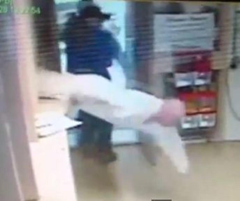 Watch an Inmate Escape Jail by Diving Headfirst Through an Open Window at the Front Desk