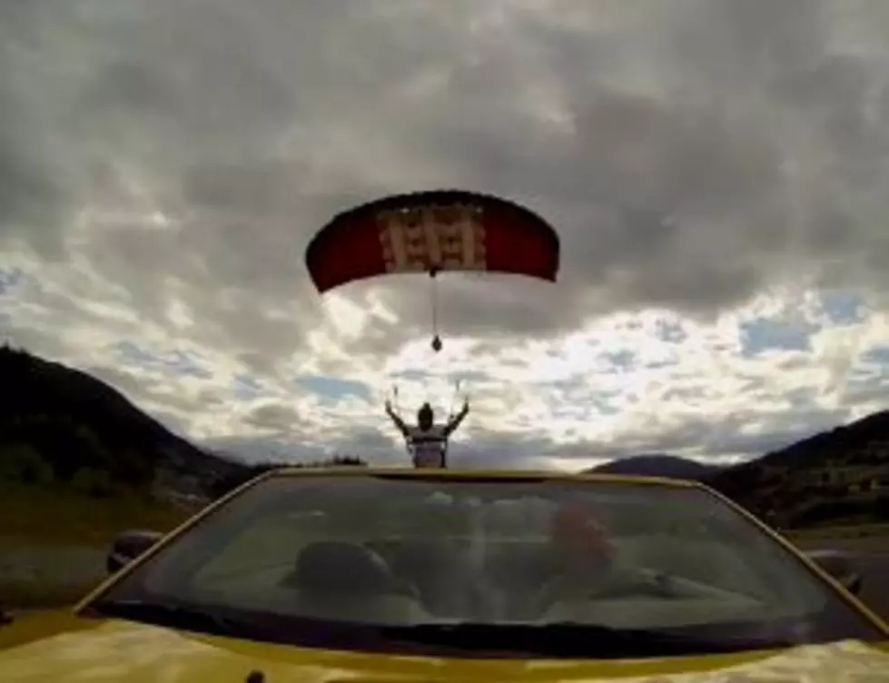 Watch a Skydiver Parachute Into a Convertible Going 40 Miles an Hour