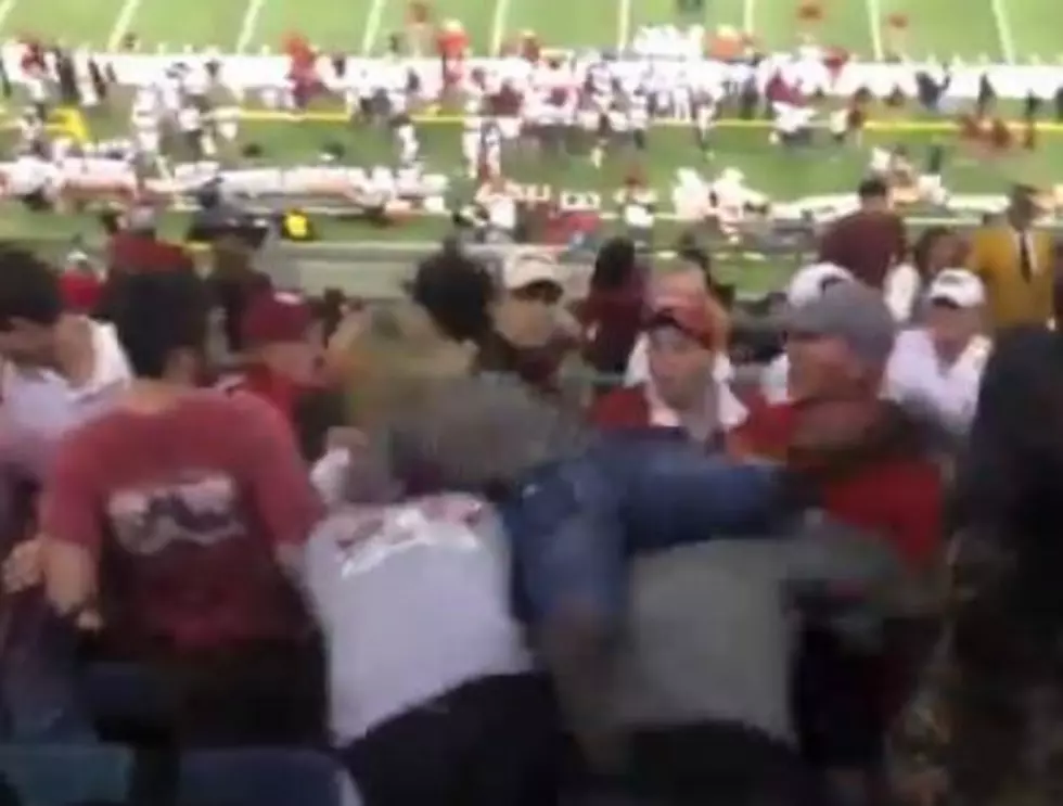Watch a Woman Start a Brawl at the Sugar Bowl by Diving Across a Row of Seats&#8230;Set to &#8220;Wrecking Ball&#8221; by Miley Cyrus