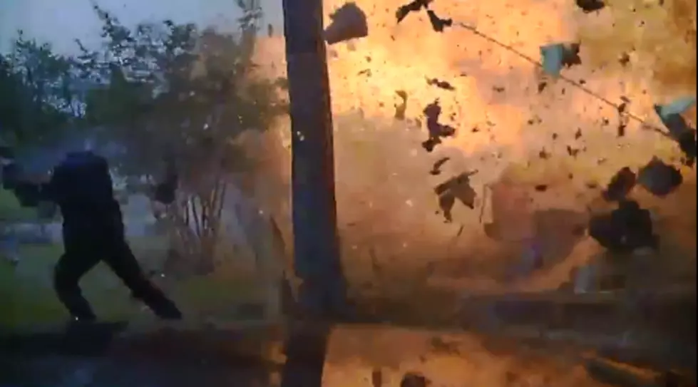 Watch Police Dashcam Video of a Texas House Exploding After a Car Crashes Into It