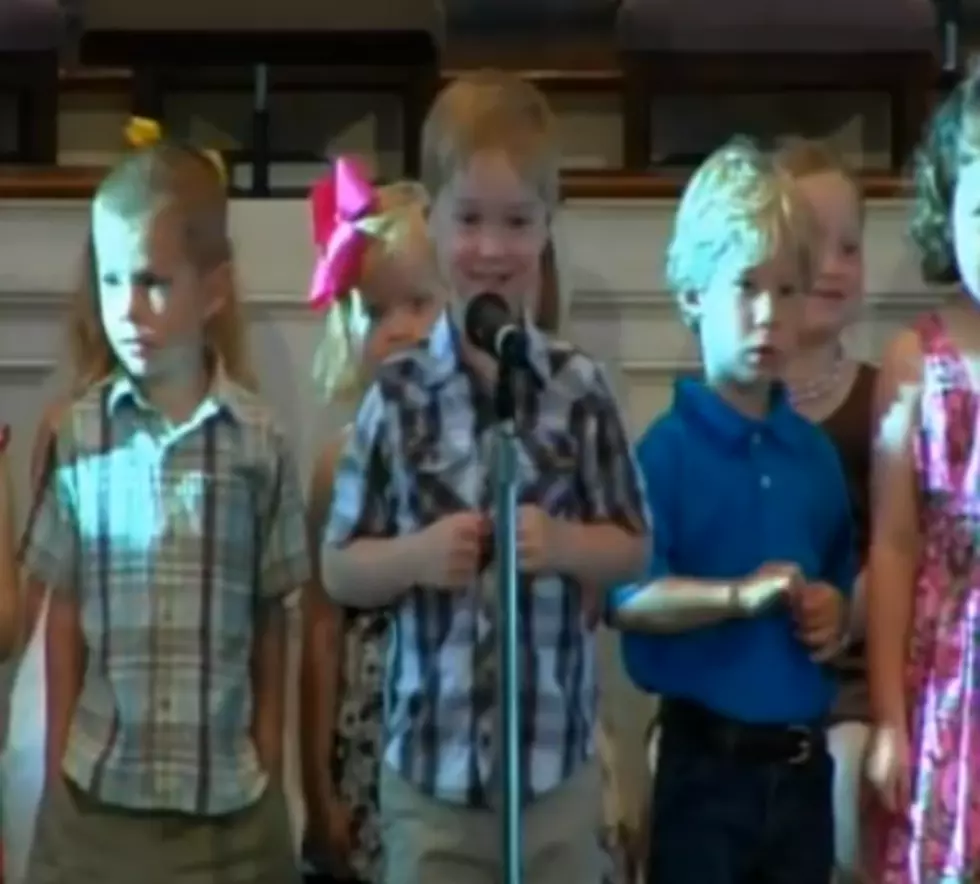 Pre-School Graduate Sings About The Bible and George Strait at His Graduation [VIDEO]
