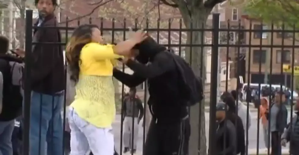 Video: Woman at Baltimore Protests Slaps Around Rioter Believed to Be Her Son
