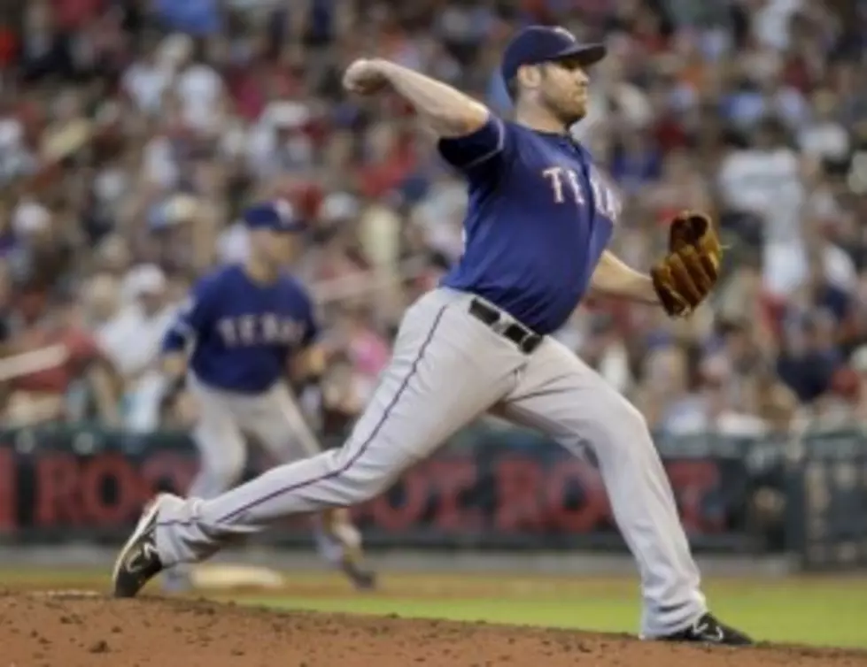 Colby Lewis Leads Texas Rangers to Five-Run Win Over Houston Astros