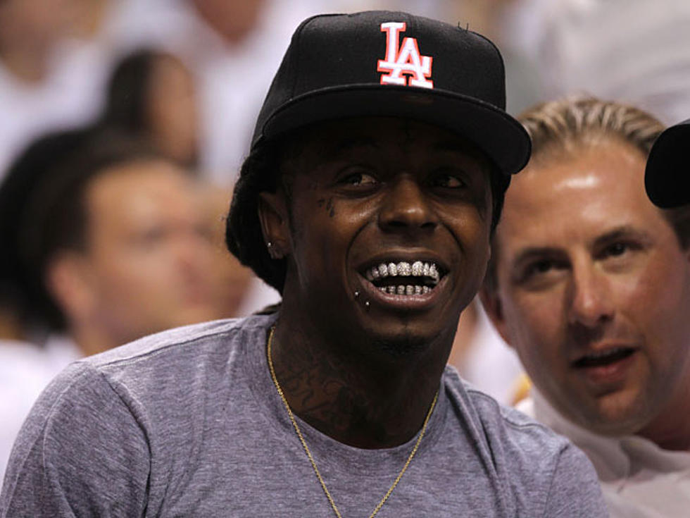 Lil Wayne’s ‘Tha Carter IV’ Sets iTunes Sales Record with 300,000 Downloads
