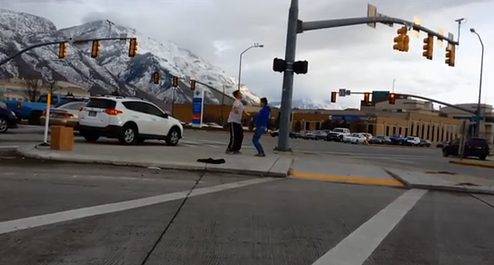 Brother Loses Bet And Has To Show Off His Moves On A Busy Intersection – VIDEO