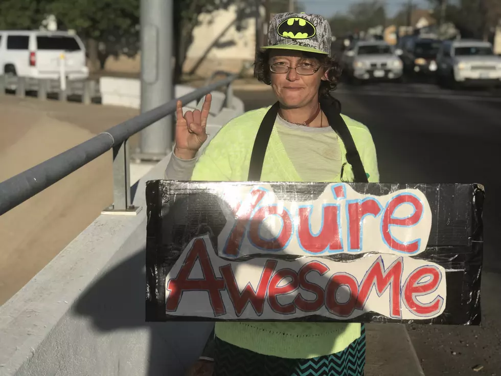 This One Woman is Making a Major Impact with Just a Sign