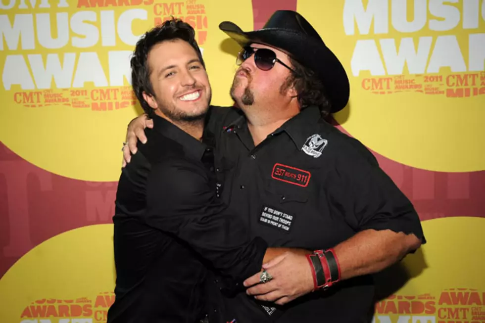 Caption This Picture: Luke Bryan’s Red Carpet Squeeze