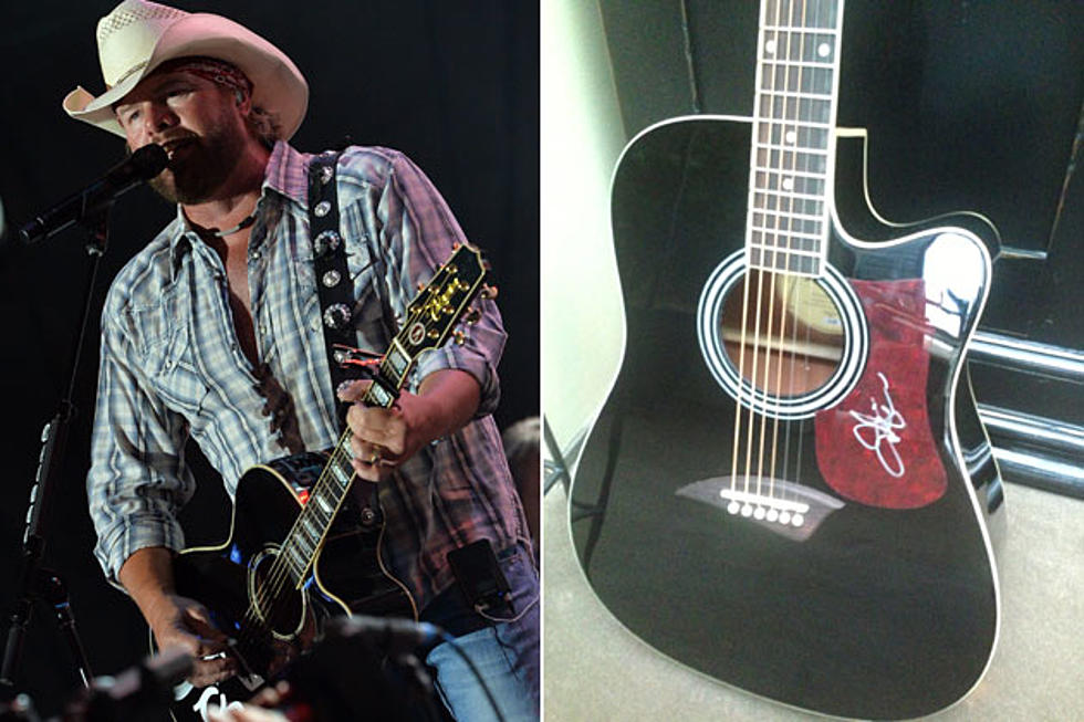 Win a Guitar Signed by Toby Keith