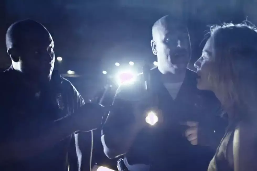 Keith Urban’s ‘Cop Car’ Video Portrays Wild Love in Flashing Lights