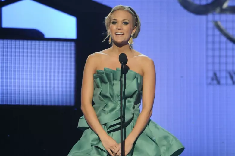 Carrie Underwood Dresses and Outfit Changes at CMA Awards 2014