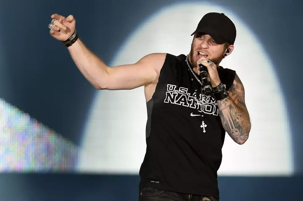 Brantley Gilbert Gets Double-Pistol Back Tattoo