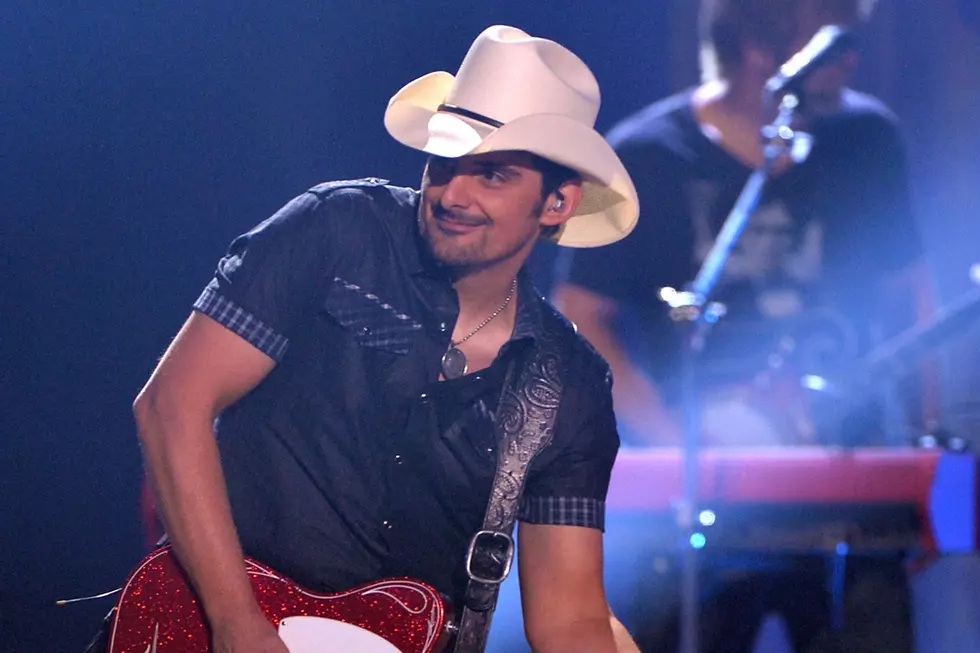 Brad Paisley Plays Photographer for Newly-Engaged Couple at His Show [Watch]
