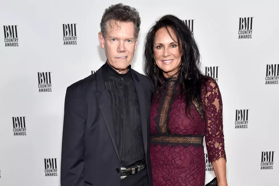 Randy Travis Surprises Police Officer Who Lost Home in Fire