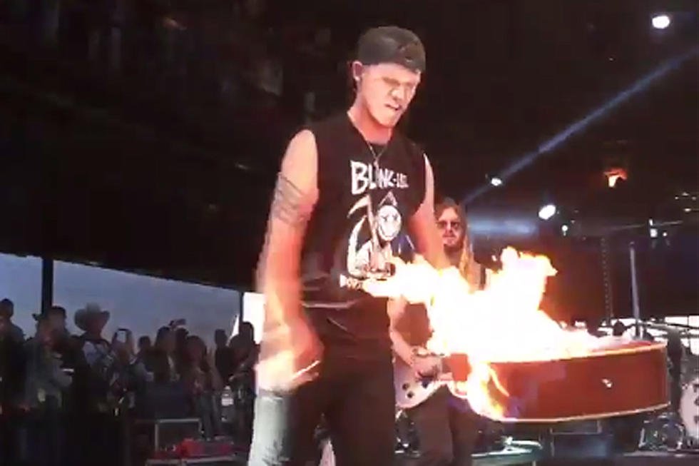 Sam Riggs Apologizes After Fiery Guitar Stunt Gets Him Removed From Festival