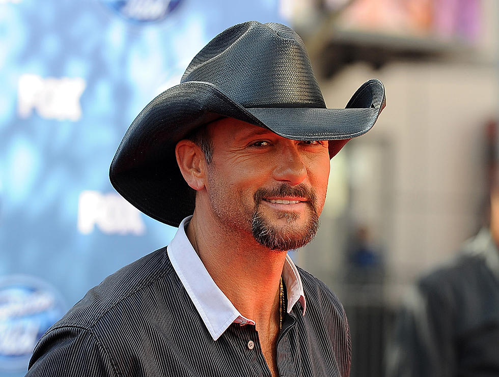 Tim McGraw Shows Off Quite a Catch in Shirtless Vacation Photo