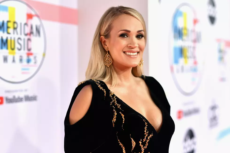 Carrie Underwood (And Her Baby Bump) Are Beyond Stunning on 2018 AMAs Red Carpet [Pictures]