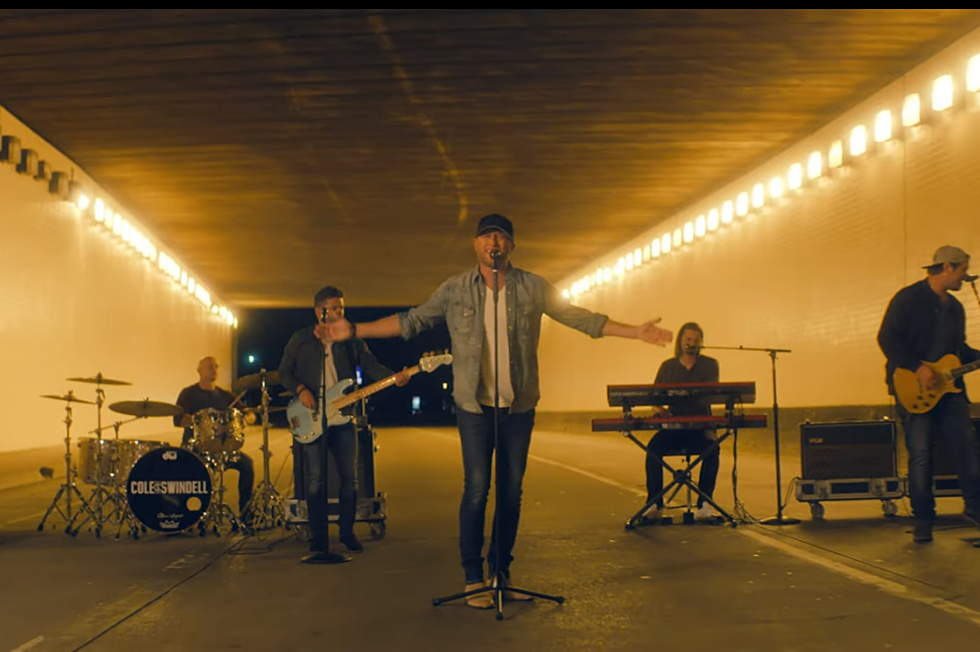 Cole Swindell Brings the Action in 'Love You Too Late' Video