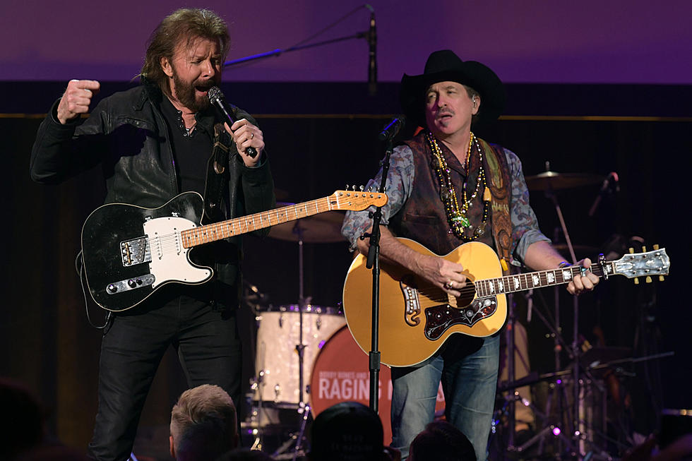 Brooks & Dunn Do the ‘Boot Scootin’ Boogie’ With Fan at Bobby Bones’ Million Dollar Show in Nashville [Watch]