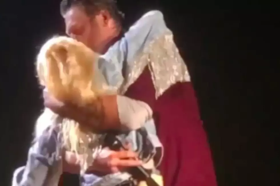 Blake Shelton Smothers Gwen Stefani With Kisses Onstage in California [Watch]
