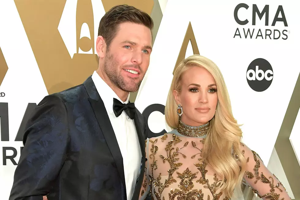 Carrie Underwood Throws It Waaaay Back in Photo With Mike Fisher