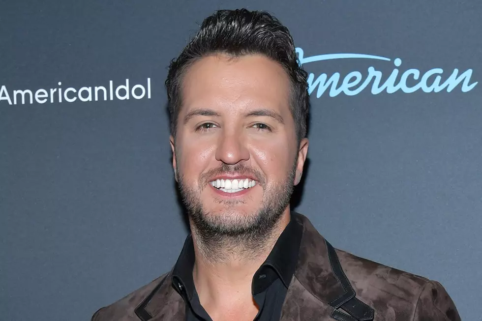 Luke Bryan Shown at NLCS Pounding Back Seltzers