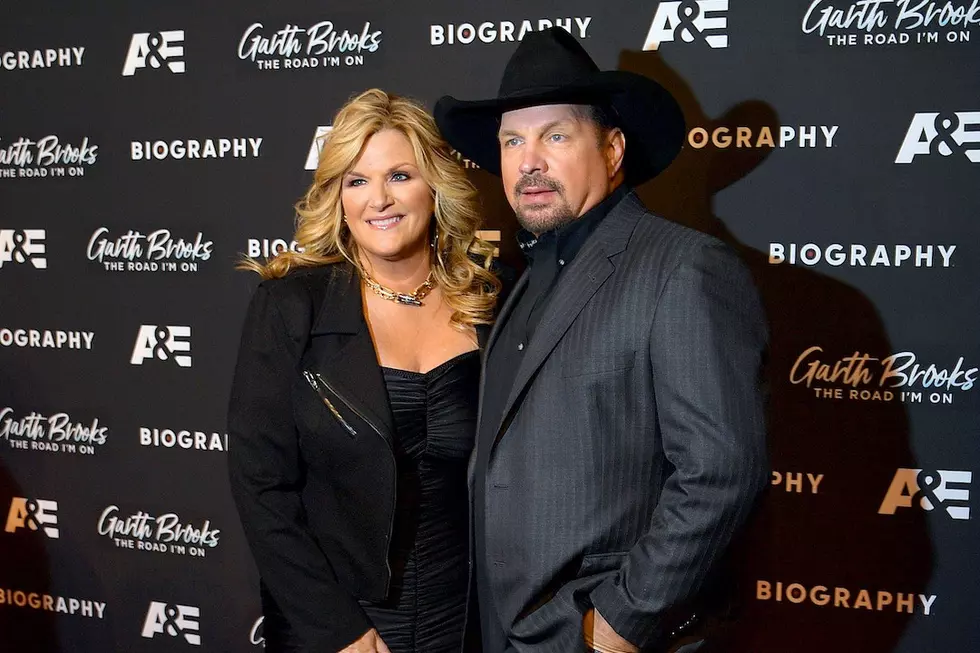 Garth Brooks, Trisha Yearwood Share Masked Kiss Ahead of BBMAs