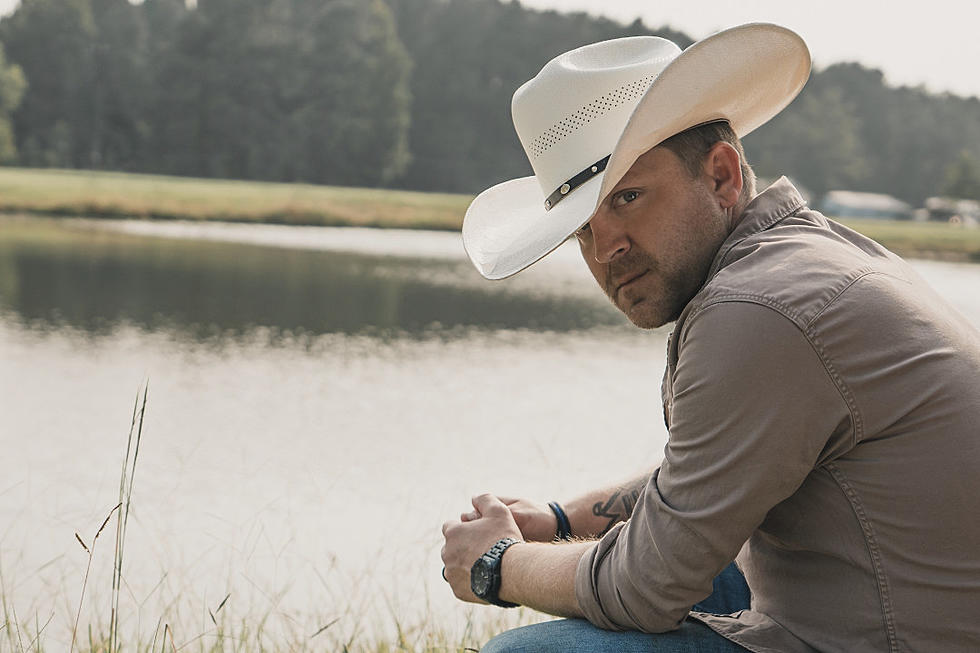 Story Behind the Song: Justin Moore, ‘With a Woman You Love’