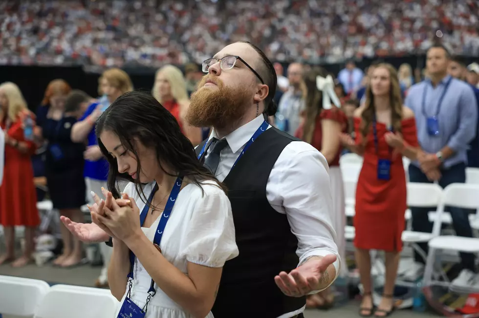 Two People Pray for Charlie Kirk