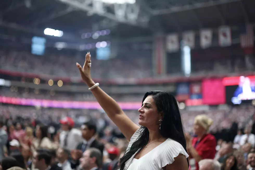 A Woman Reacts To a Speech During a Memorial for Charlie Kirk
