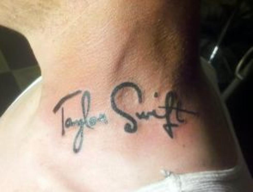Record Company Rep Gets “Taylor Swift” Tattooed On His Neck