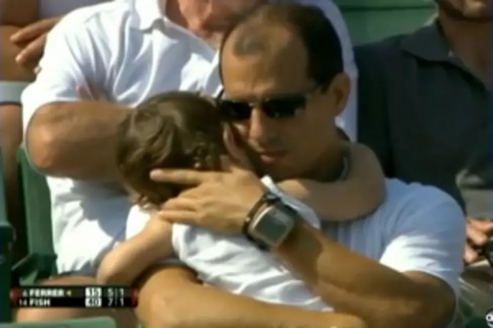 Tennis Star David Ferrer Lobs Tennis Ball at Crying Baby