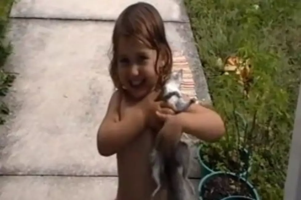 Girl Playing With Dead Squirrel [VIDEO]