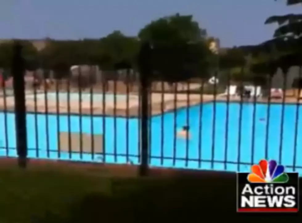 Nude Jogger Dives Into Public Pool [VIDEO]