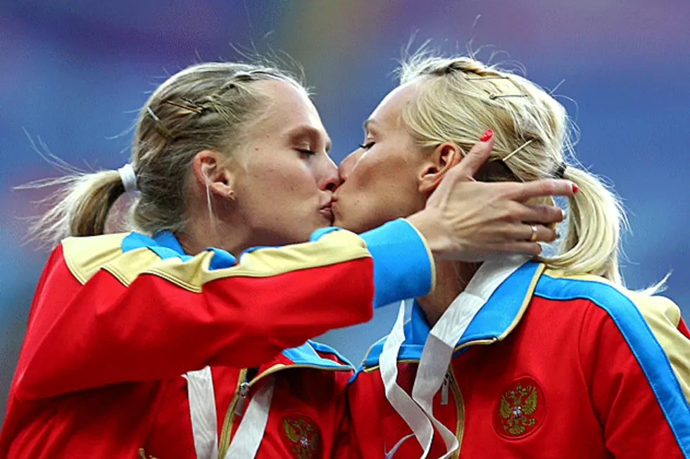 Russian Track Stars Kiss on Medal Stand to Protest Country’s Controversial Anti-Gay Laws