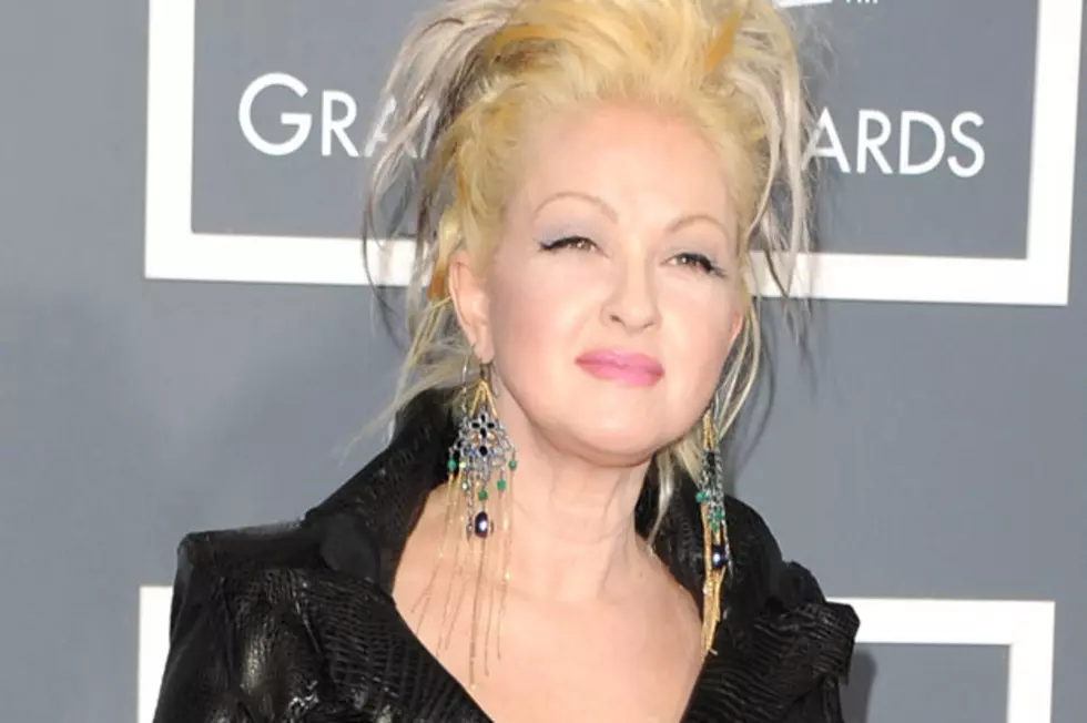 Cyndi Lauper Calms Angry Fliers With a Performance of 'Girls Just Wann...