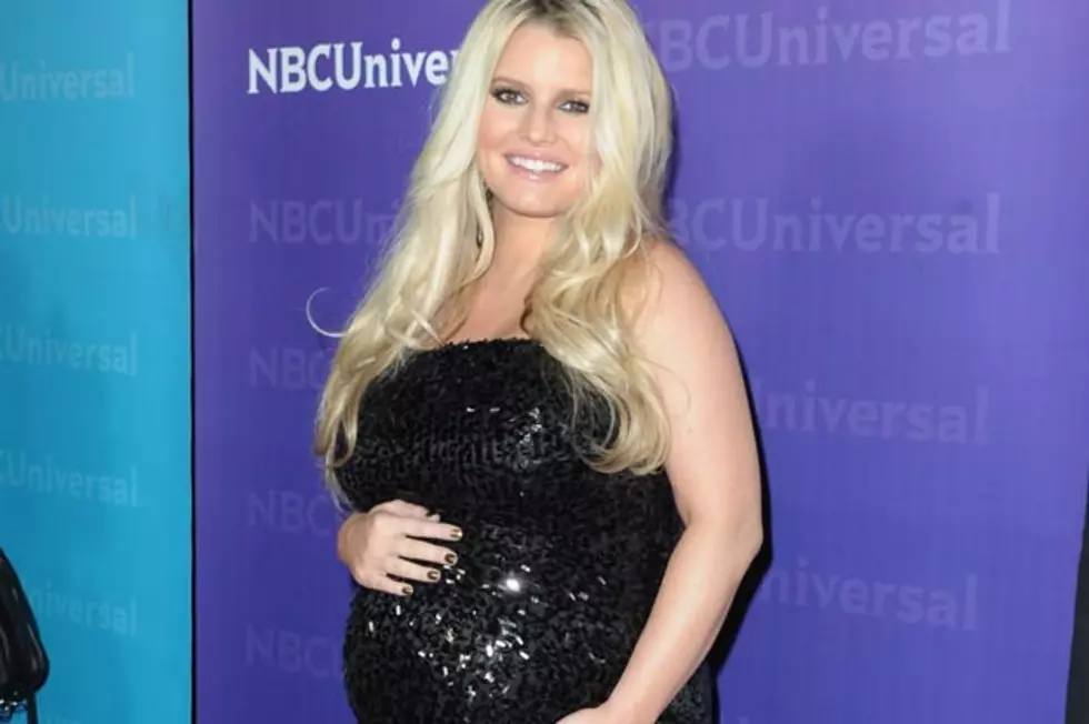 Jessica Simpson Wears Blue Snakeskin Dress to Baby Shower