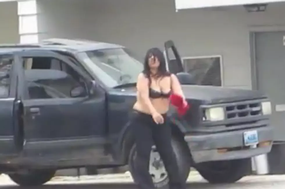 Topless Woman Dances on the Street to Katy Perry Track