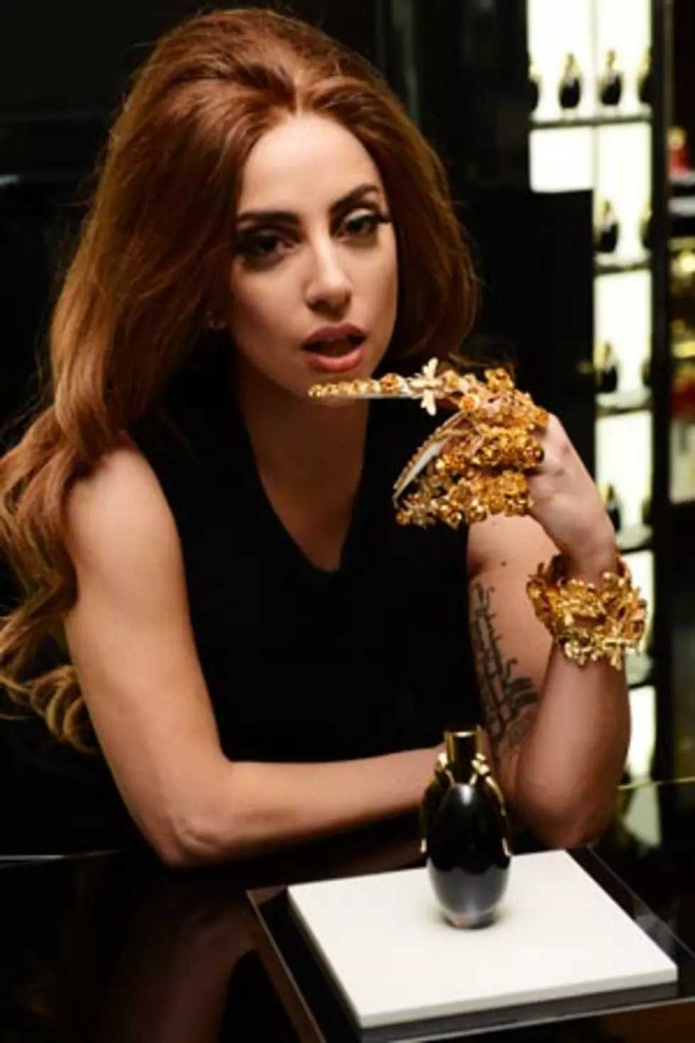 Lady Gaga Wears Goldfingers to Fame Launch in London