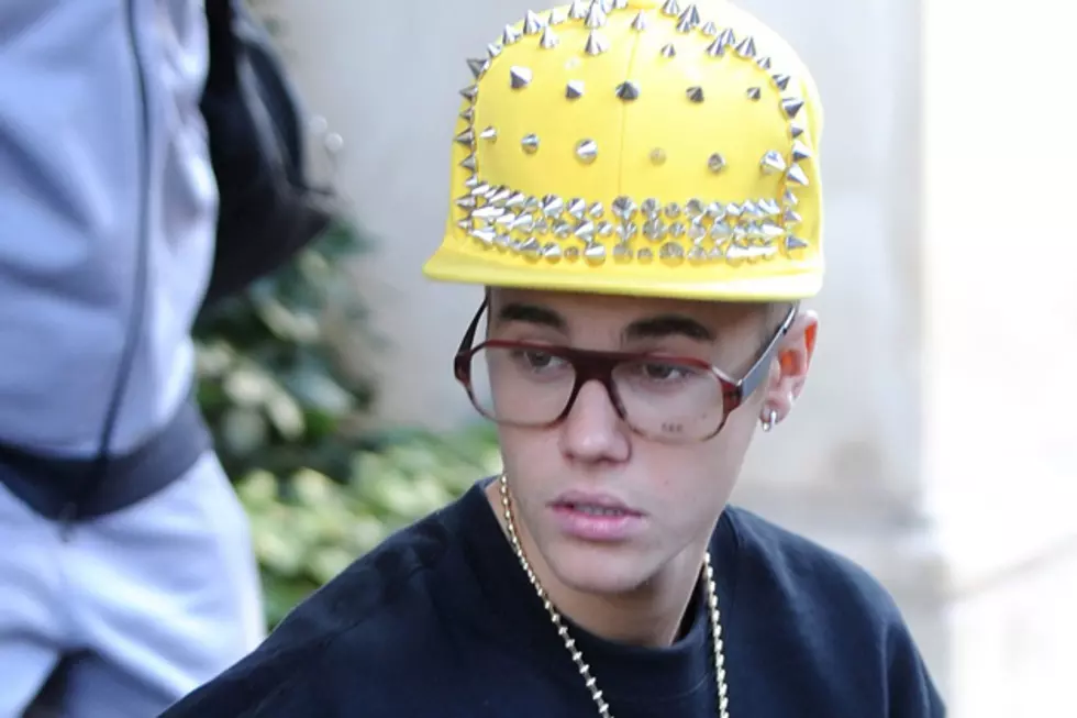 Justin Bieber Steps Out in Studded Yellow Cap + Purple Leopard Print Pants [PICS]