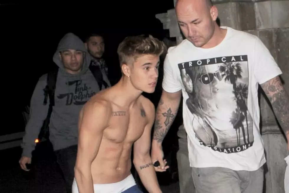 Justin Bieber Gets Semi-Naked at Polish Airport