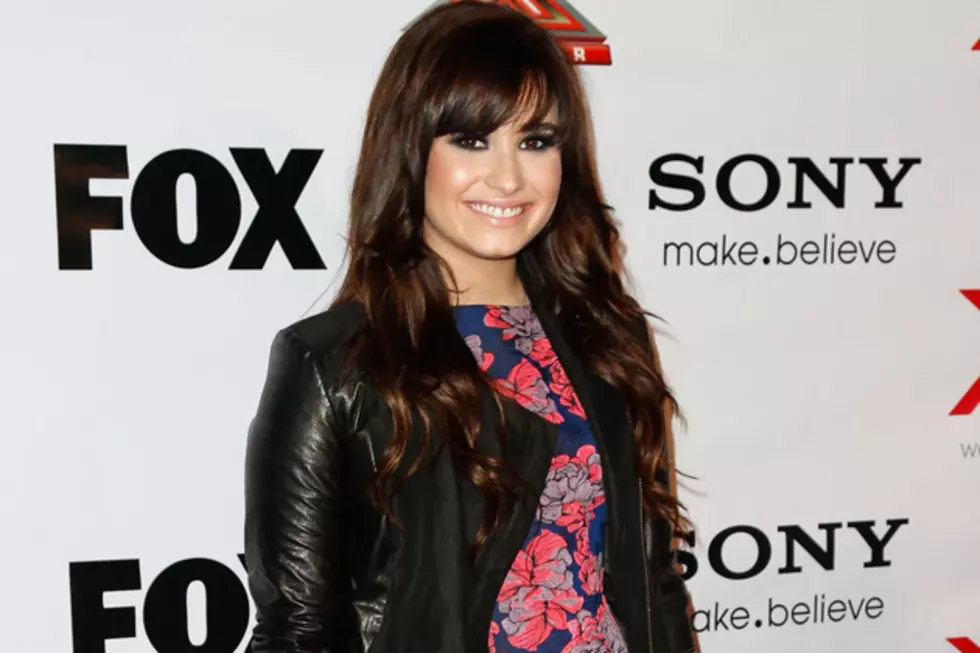 Demi Lovato in Floral Topshop Dress + Black Leather Jacket – Get the Look