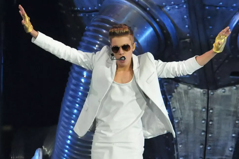 Justin Bieber Fan Chucks Bra on Stage in Germany [Video]