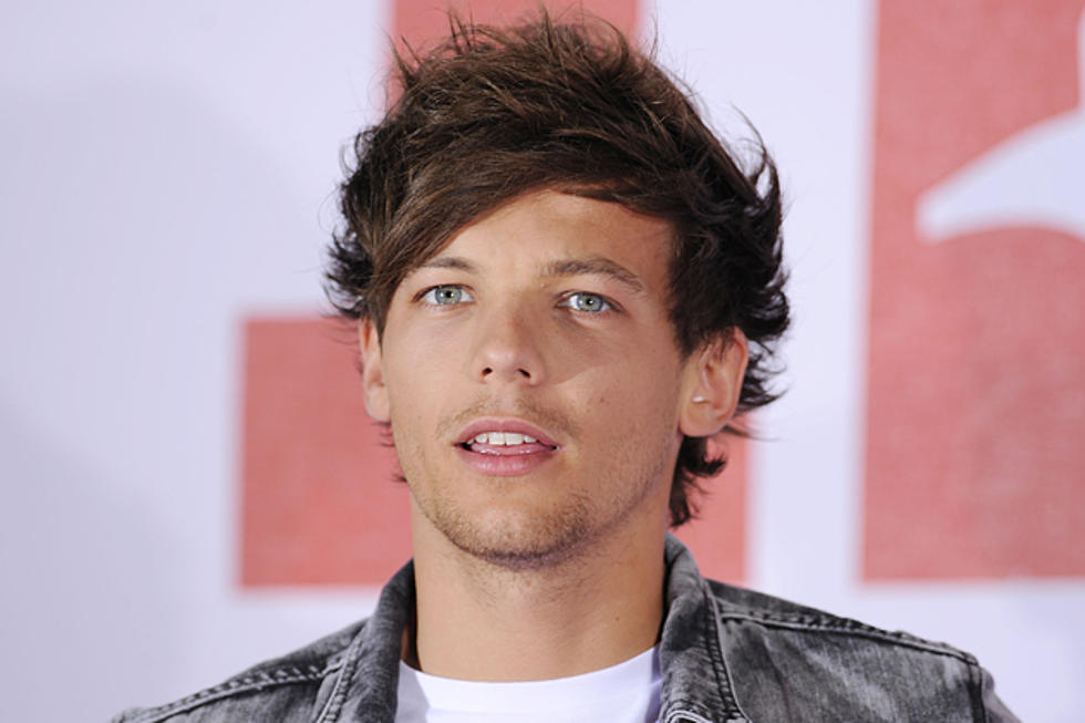 Louis Tomlinson Falls Onstage While Performing &#8216;Kiss You&#8217; [Video]